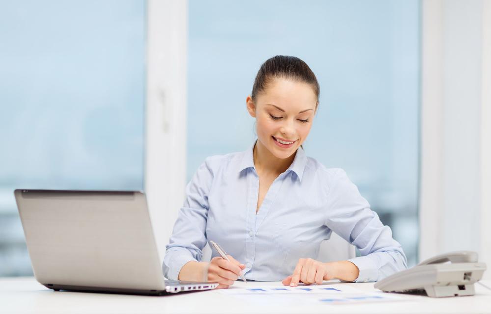 A business accountant calculating payroll taxes for a small business in New Jersey.